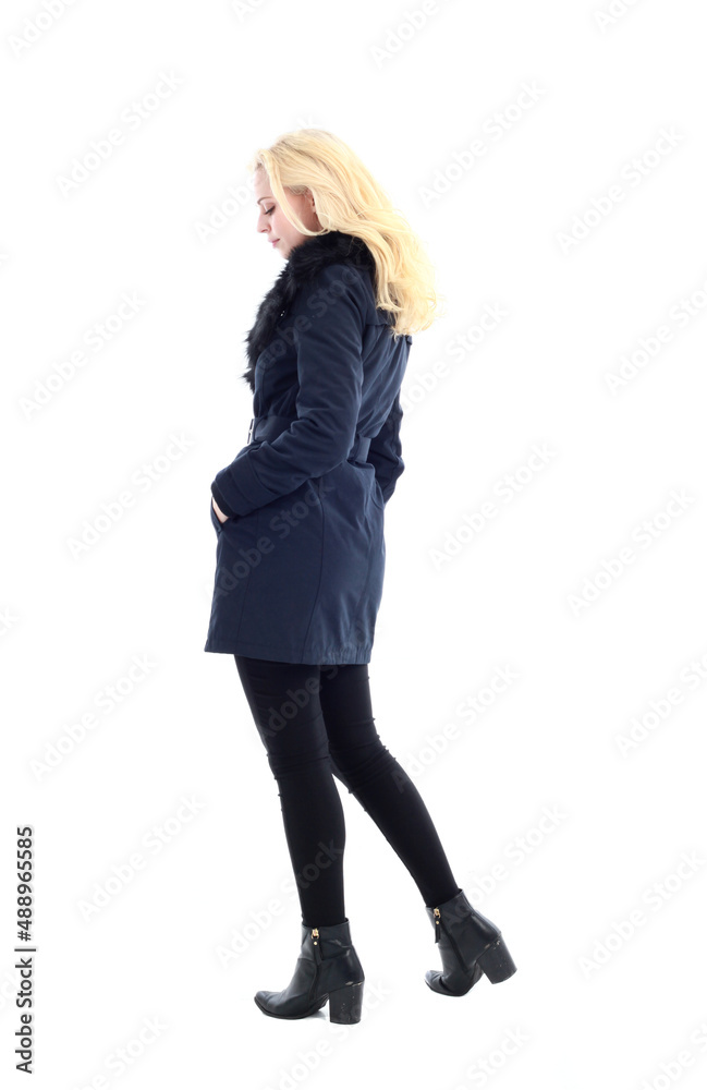 full length portrait of blonde woman wearing long winter coat. and casual clothes. standing pose, isolated on a white studio background. full length portrait of blonde woman wearing long winter coat. and casual clothes. standing pose, isolated on a white studio background.