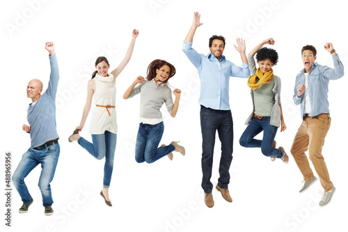 Celebrations in isolation. Full body shot of a group of excited people jumping into the air.