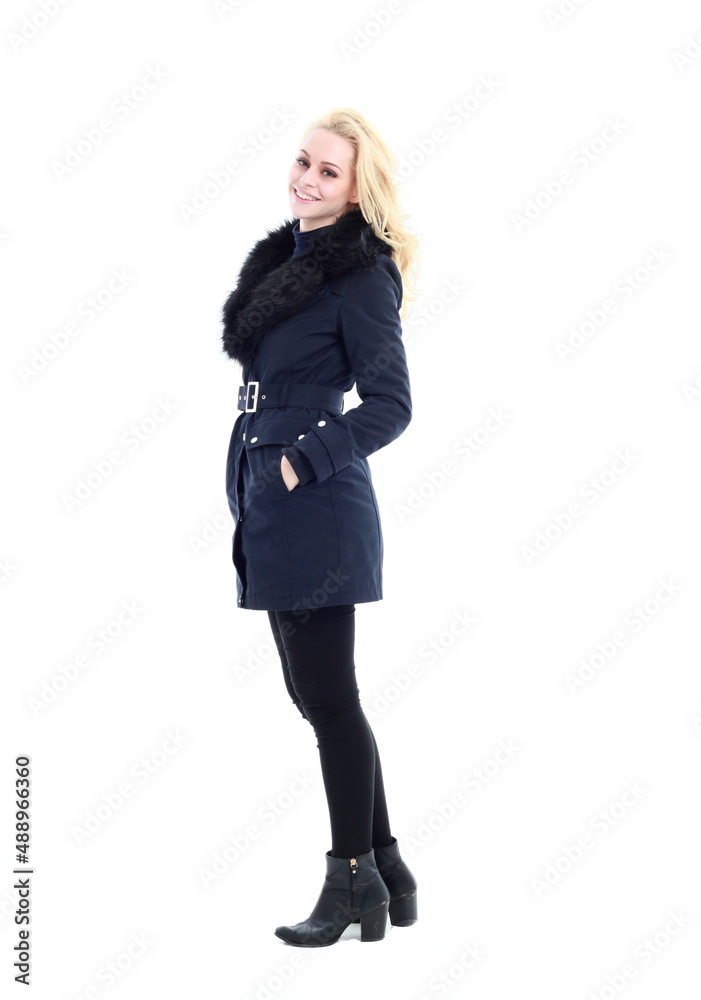 full length portrait of blonde woman wearing long winter coat. and casual clothes. standing pose, isolated on a white studio background. full length portrait of blonde woman wearing long winter coat. and casual clothes. standing pose, isolated on a white studio background.