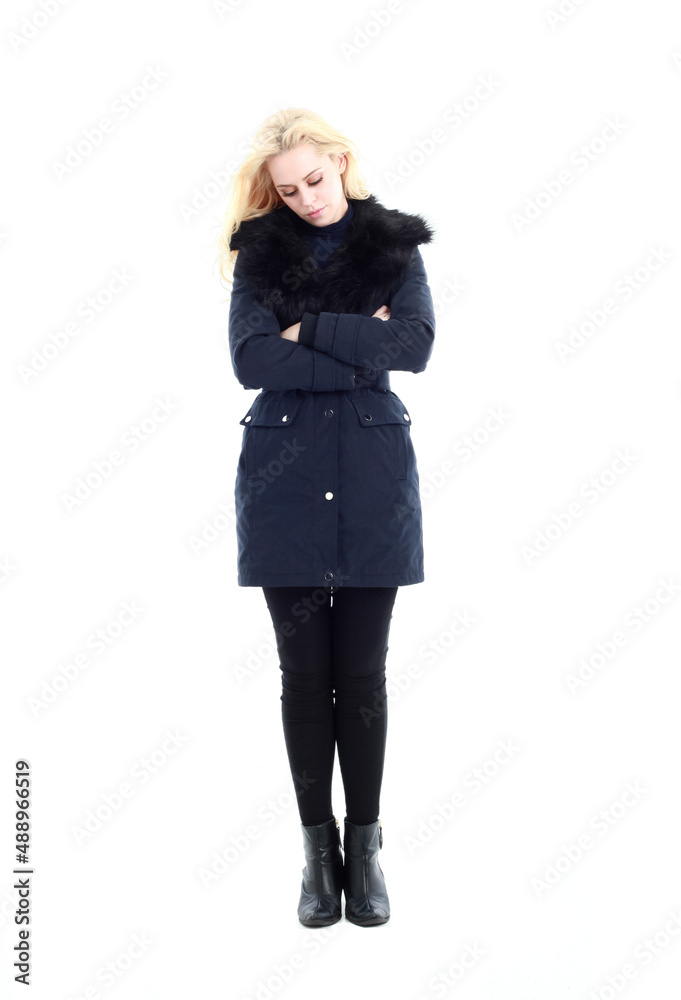 full length portrait of blonde woman wearing long winter coat. and casual clothes. standing pose, isolated on a white studio background. full length portrait of blonde woman wearing long winter coat. and casual clothes. standing pose, isolated on a white studio background.