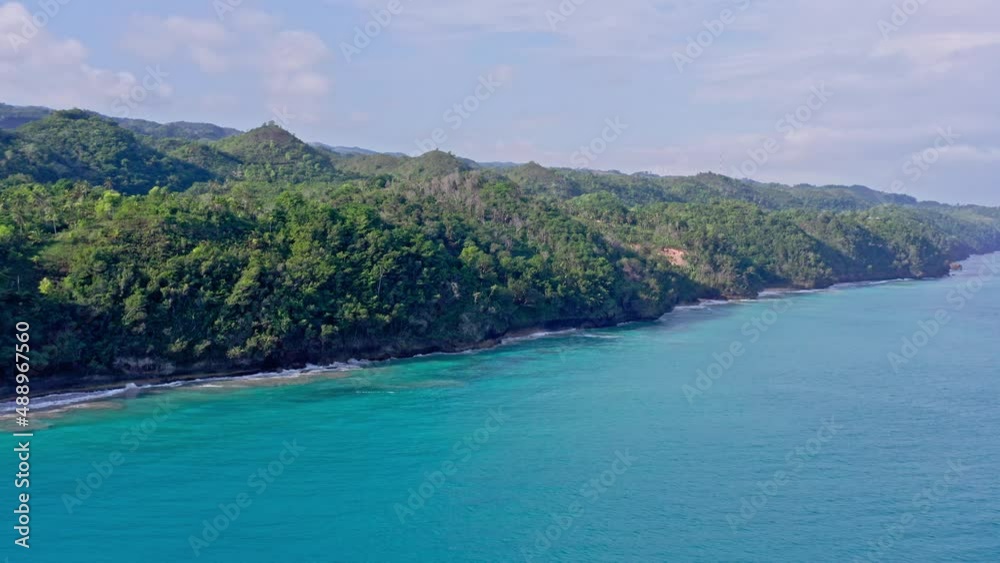 Aerial View of Beautiful Scenery of Playa Coson Shoreline, Lush Greenery and Crystal Clear Turquoise Ocean Waters Aerial View of Beautiful Scenery of Playa Coson Shoreline, Lush Greenery and Crystal Clear Turquoise Ocean Waters