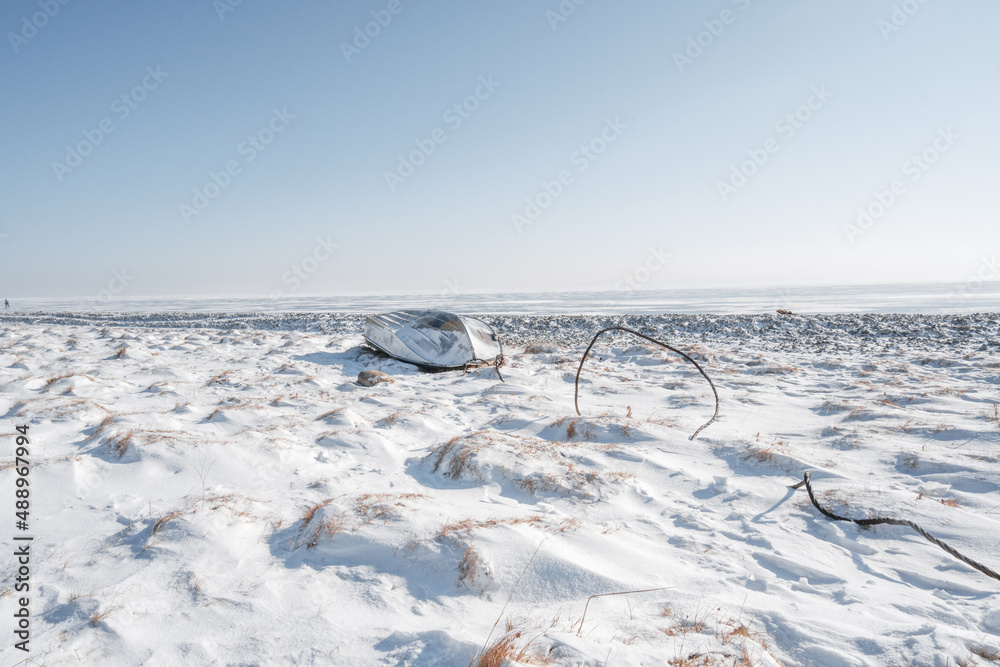 boat in winter landscape snow covered boat in winter landscape snow covered