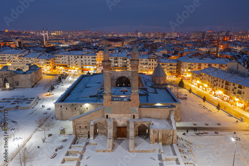 Double Minaret Madrasah was built in 1271 İlhanlı period. The tile decorations on the minarets are remarkable. Sivas, Turkey. photo