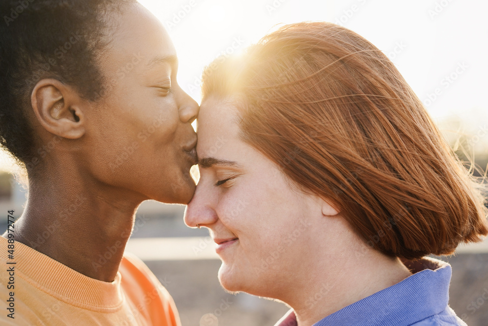 Naklejka premium Happy women gay couple having tender moment outdoor - Lgbt and love concept