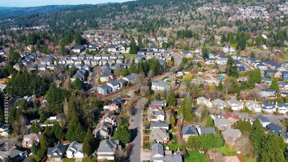 4K aerial drone shot overlooking Suburban neighborhood houses in Portland, Oregon. 4K aerial drone shot overlooking Suburban neighborhood houses in Portland, Oregon.