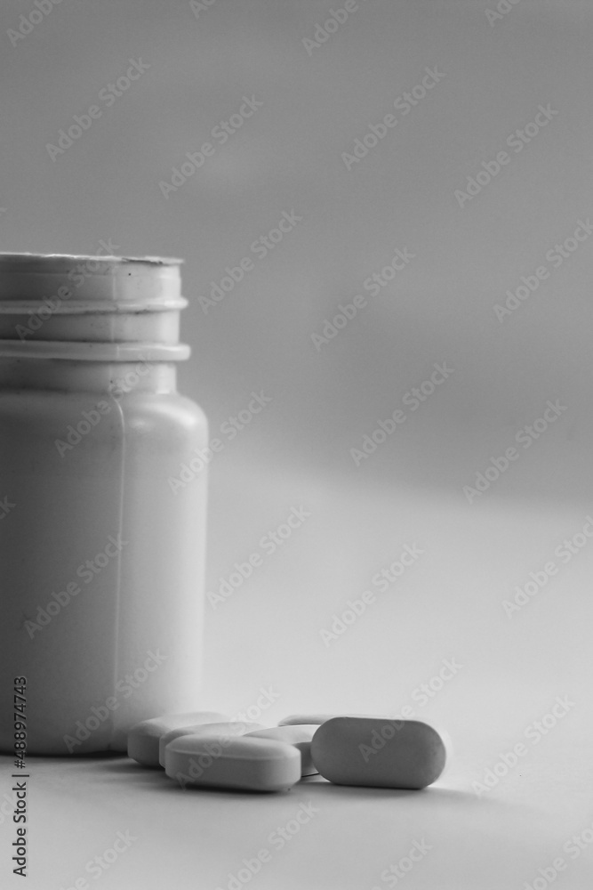 white pills and bottle