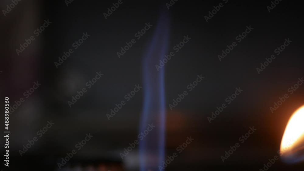 Opening the Gas and Lighting the Flame on the Kitchen Stove. Starting the Calor Gas Burner at Home. Global Energy Crisis. Environment Protection Concept. Gas Is a Polluting Source of Energy. Opening the Gas and Lighting the Flame on the Kitchen Stove. Starting the Calor Gas Burner at Home. Global Energy Crisis. Environment Protection Concept. Gas Is a Polluting Source of Energy.