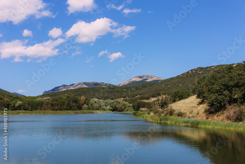 Fototapeta Naklejka Na Ścianę i Meble -  Beautiful lake in the Crimean mountains among greenery and flowers