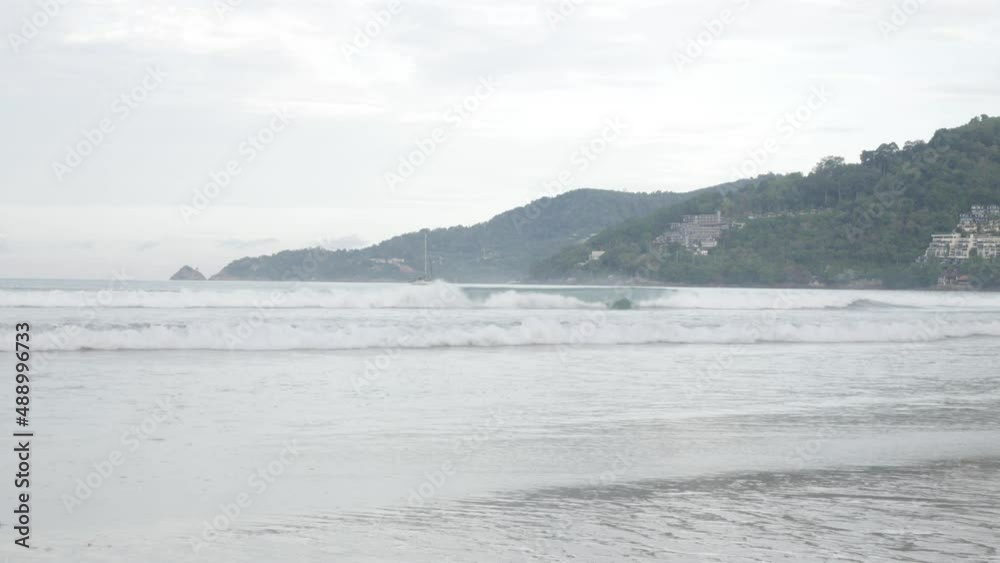 Beach sea sand and sky. Landscape view of beach sea in summer day. Beach space area with peaceful sea in sunshine daytime Beach sea sand and sky. Landscape view of beach sea in summer day. Beach space area with peaceful sea in sunshine daytime