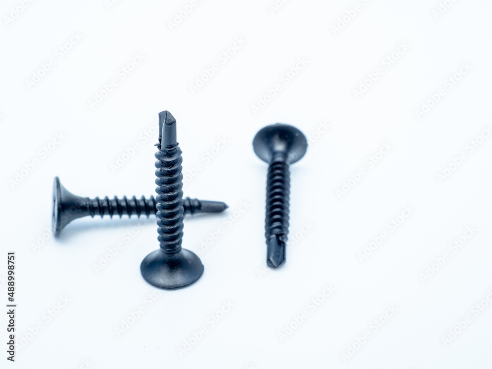 Drywall screw isolated on white Drywall screw isolated on white