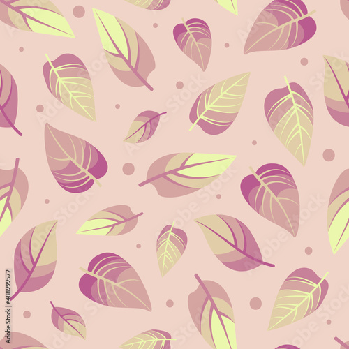 Vector seamless spring pattern with pastel pink falling leaves on pink background with different size dots.