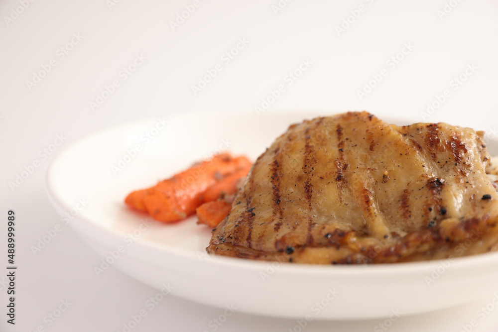 Grilled chicken with rice isolated in white background Grilled chicken with rice isolated in white background