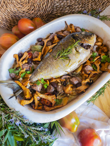 Baked gilthead with mushrooms photo