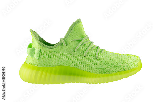 Green rag sneaker with a polyurethane sole on a white background.