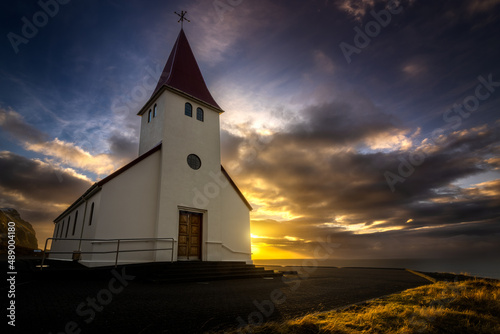 The famous icelandic church at sunrise in Vik y Myrdal, Iceland