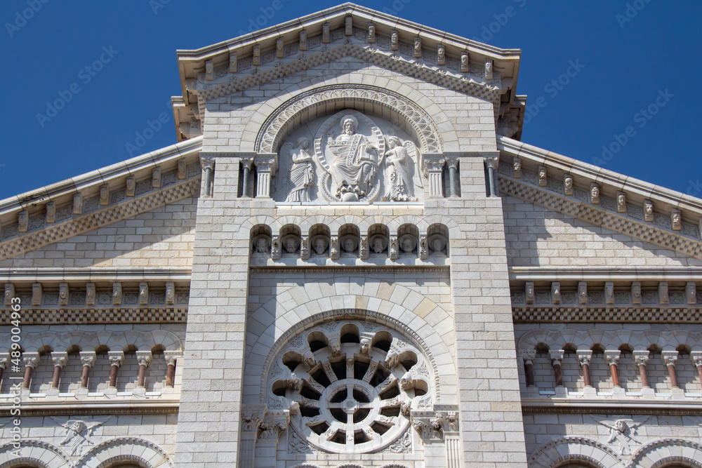 Detail of the outer walls of the church Cathedral of the Immaculate Conception Monaco. At the end on the roof are the symbols of the Evangelists. Romanesque Catholic Cathedral 