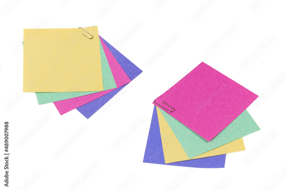 A sticker and a paper clip isolated on a white background A sticker and a paper clip isolated on a white background