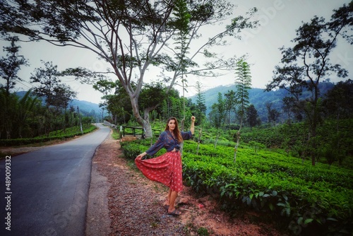 woman in a red dress in sri lanka 