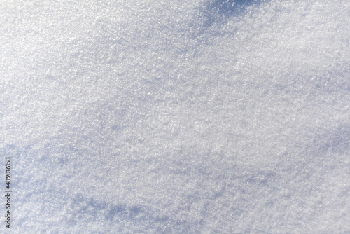 Clean, white snow close-up. Winter background. Snow surface. Fresh fluffy white snow texture.White snowflakes. High quality photo © Анатолий Савицкий