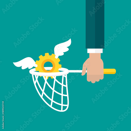 Businessman hand with butterfly net with flying golden gear cog. Catch, chase know how and solutions symbol. Innovation technology search concept.