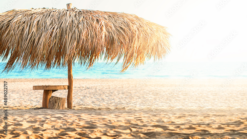 palapa sun roof beach umbrella in caribbean