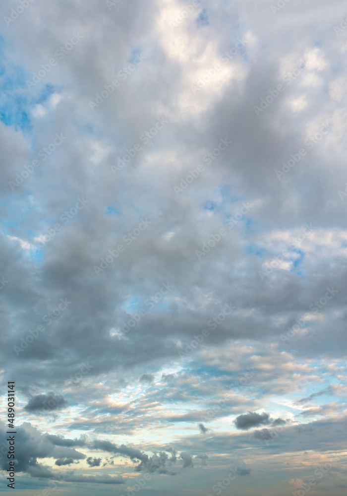Fantastic clouds at sunrise, vertical panorama Fantastic clouds at sunrise, vertical panorama