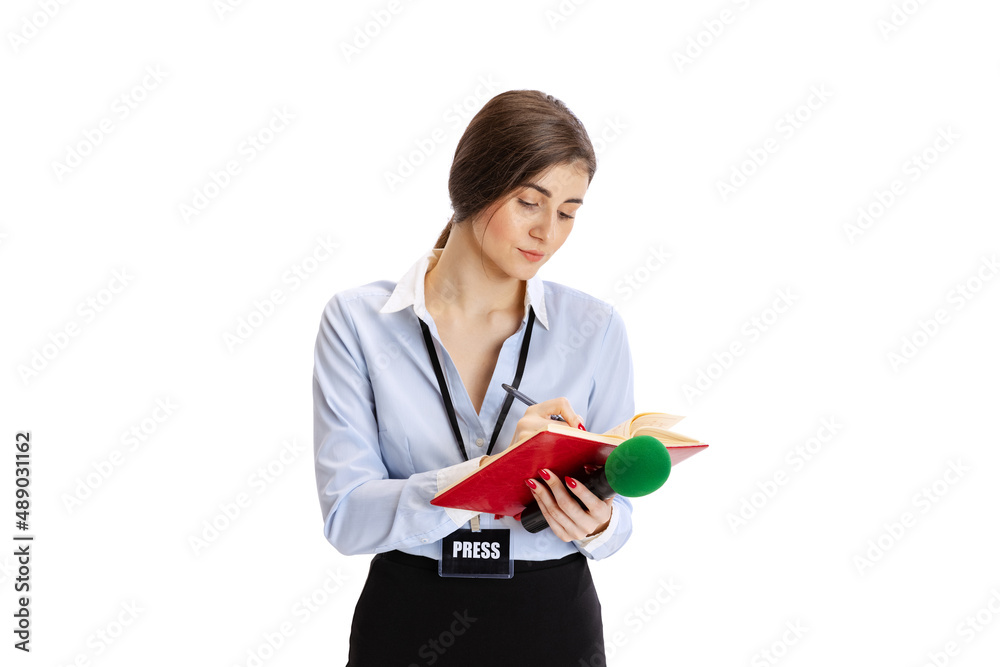 Young beautiful girl, female journalist holding reporter microphone isolated on white studio background. Concept of social media, press, news, information Young beautiful girl, female journalist holding reporter microphone isolated on white studio background. Concept of social media, press, news, information