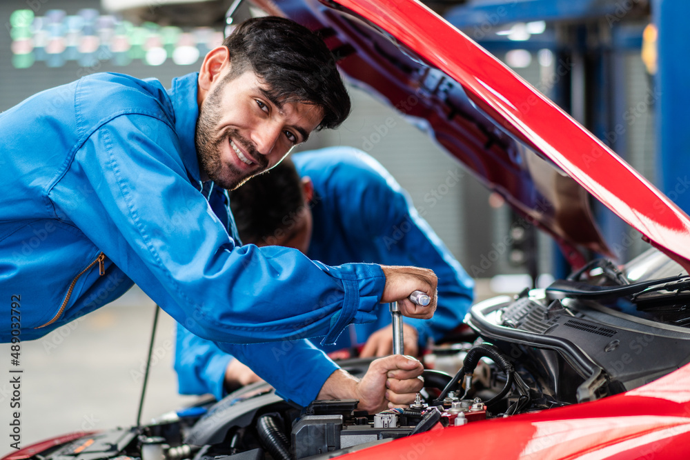 Caucasian automobile mechanic man checking car damage broken part condition, diagnostic and repairing vehicle at garage automotive, motor technician maintenance after service concept Caucasian automobile mechanic man checking car damage broken part condition, diagnostic and repairing vehicle at garage automotive, motor technician maintenance after service concept