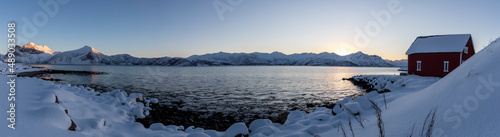 Obraz na płótnie panoramic view sunset in Skaland on island Senja in northern Norway in winter w salonie