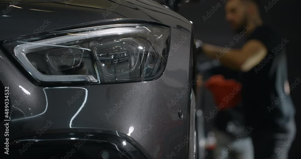 Process of the nano ceramic coating application at the car detailing service center, 4k 60p Prores Process of the nano ceramic coating application at the car detailing service center, 4k 60p Prores