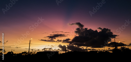 sunset seen from a village