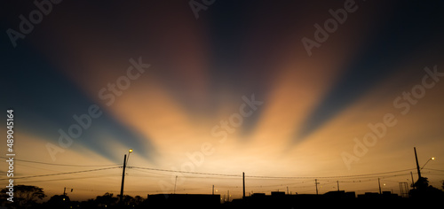 sunset seen from a village