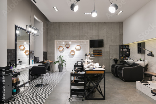 Obraz na płótnie Modern interior of the beauty salon which consist of nail salon and barbershop. w salonie