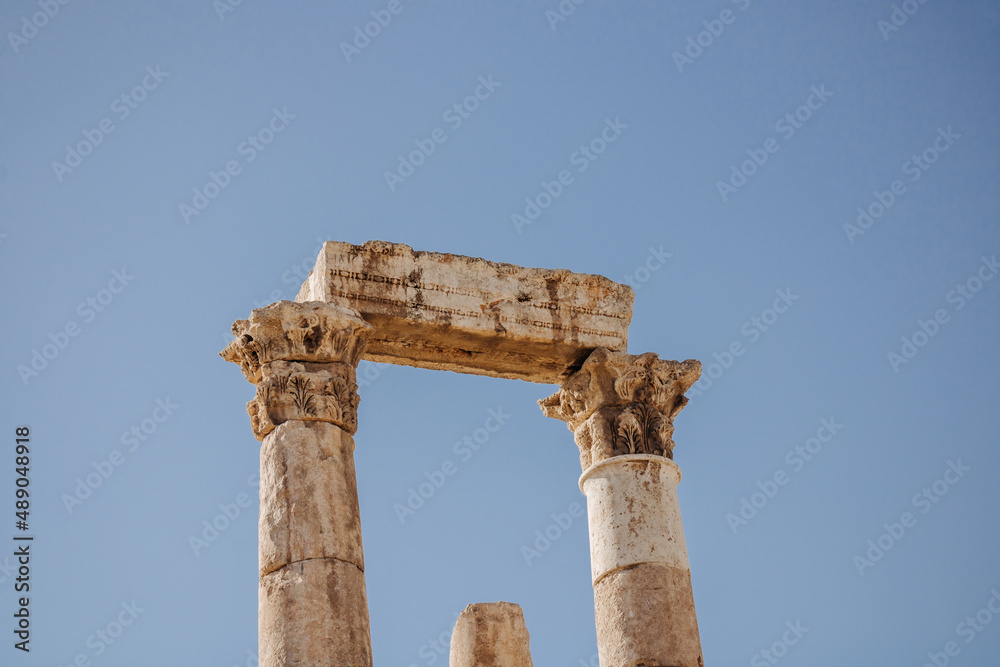 Columns. Ruins of ancient buildings. Ancient columns against a clear sky.