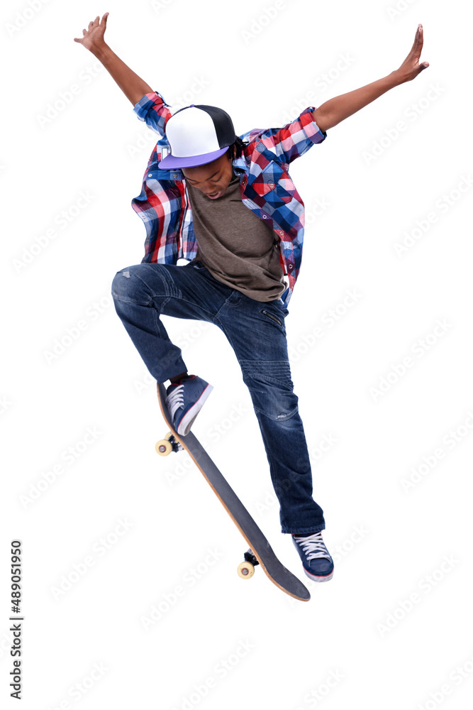 Born for boarding. An African-American boy doing a trick on his skateboard.  Stock Photo | Adobe Stock