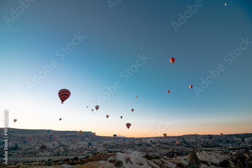 Cappadocia. Hot air balloons in Cappadocia at sunrise. Ballooning activity in Goreme. Noise included.