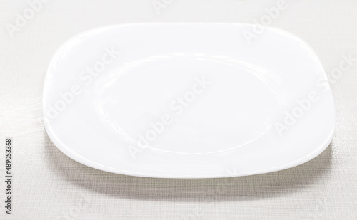 modern empty plastic plate mockup, on kitchen table, space for text, copy space, advertising use