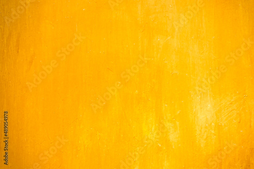 Textures of orange painted grunge concrete background