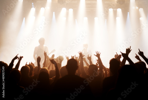 Live music is the only music. Shot of fans enjoying a rock show.
