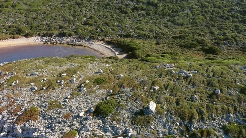 Aerial view of woman exploring landscape near Methoni, Greece photo