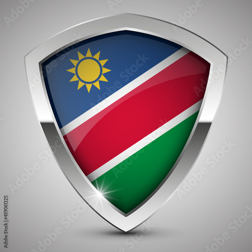 EPS10 Vector Patriotic shield with flag of Namibia. Free Download EPS10 Vector Patriotic shield with flag of Namibia. - GFXLoad