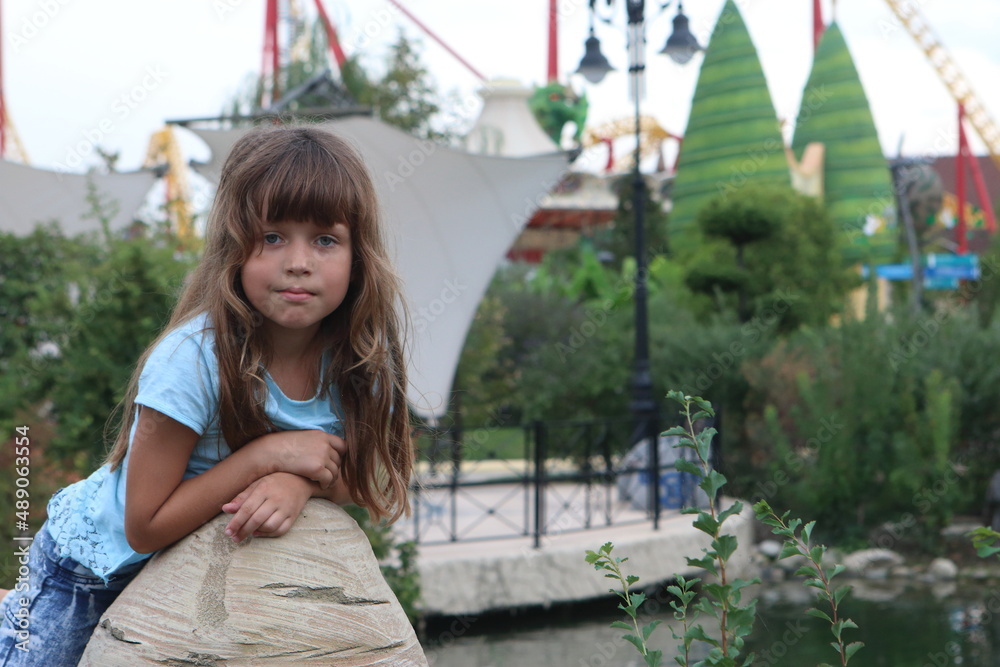 Girl playing on the territory of Sochi park