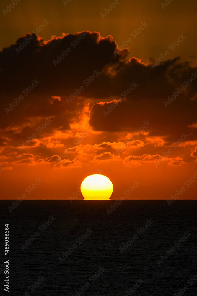 Sun sises above the horizon in the morning on the on the Canary Island of Fuerteventura
