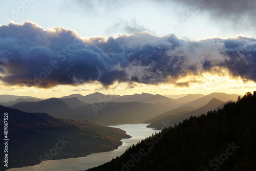 sunset over the mountains and Serre Ponçon lake, southern Alps, France