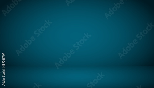 Abstract background. The studio space is empty. With a smooth and soft dark blue color