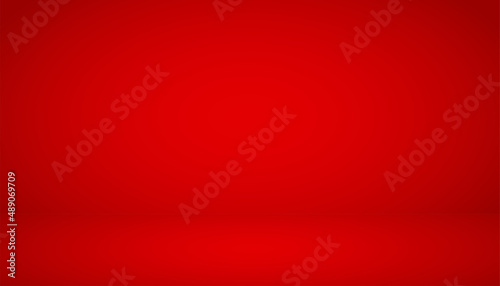 Abstract background. The studio space is empty. With a smooth and soft red color