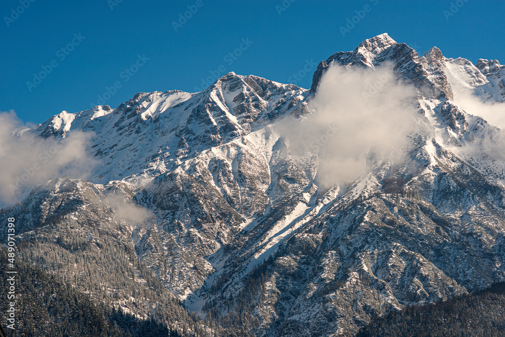 snow-covered mountains in the near of Saalfelden, a city in the region of Zell am See in Salzburg, Austria