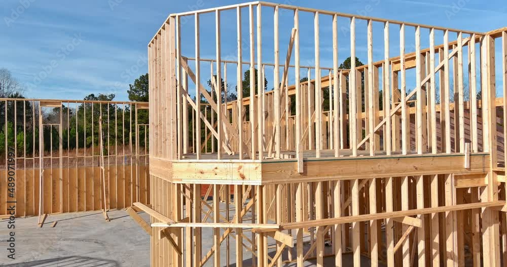 Panorama top view of framing beams stick built home under construction under framing structure wood frame building construction