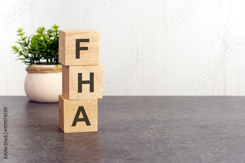 word FHA made with wood building blocks photo