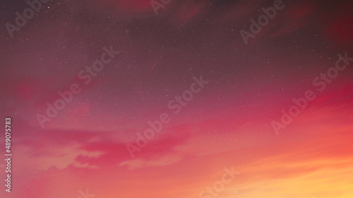 Living coral color. Vivid Evening Bright Sky Natural Background Backdrop In Yellow And Pink Colors. Copyspace. space stars starlight Starry sky universe panoramic view panorama.